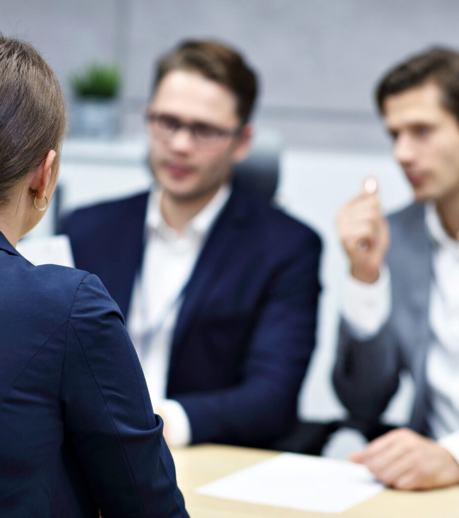 Female arbitrator talking to clients